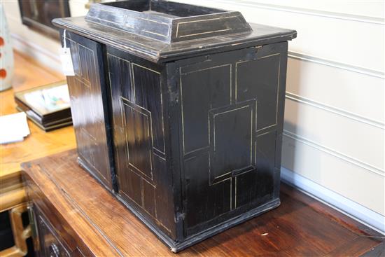 A 19th century Flemish ebonised table cabinet, 21in.